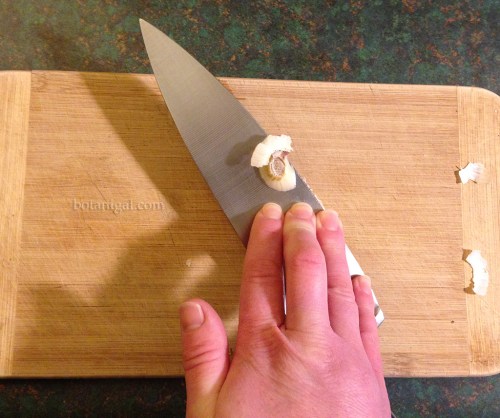 Pressing garlic clove with knife blade IMG_3389.jpg
